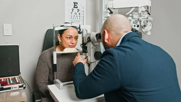 istock Optometrist Conducting a Professional Eye Examination in a Modern Clinic 2196540104