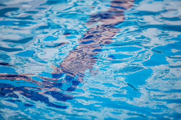 istock Clear Blue Swimming Pool Water with Gentle Ripples 2196540331