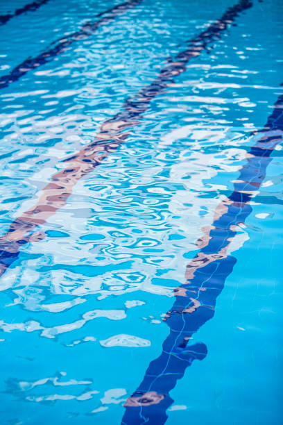 istock Clear Blue Swimming Pool Water with Gentle Ripples 2196540520