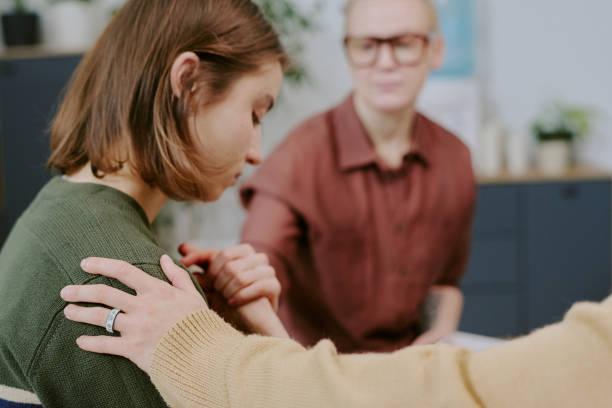istock Comforting Friend Offering Emotional Support Gesturing Care 2196542543