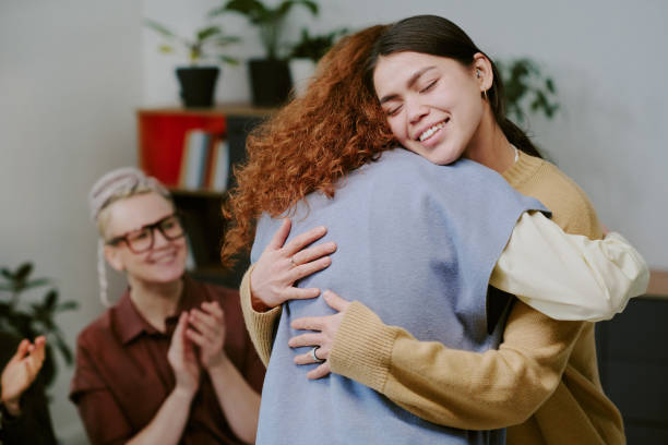 istock Embracing Happiness with Friends in Cozy Interior Setting 2196542815