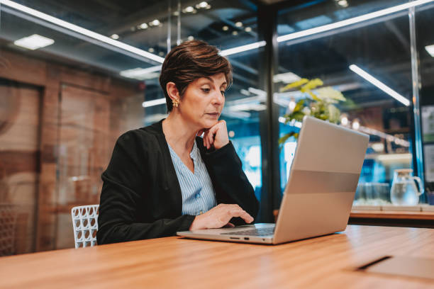 istock Business woman working on laptop 2196545553