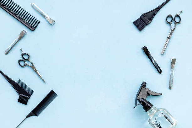 istock Frame of barber tools. Different kind of combs and scissors, top view 2196545566