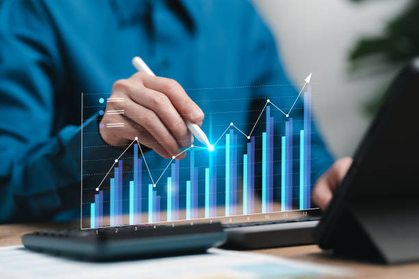 istock Comparison growth graphs of business and financial concept, Businesswomen analyzing data chart of finance and return on investment, Planning and adjusting strategies to achieve goals, Market target 2196550740
