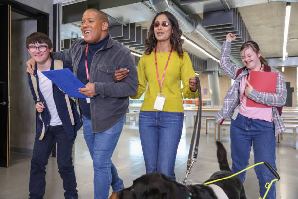 istock Group of disable people walking at community center 2196551757