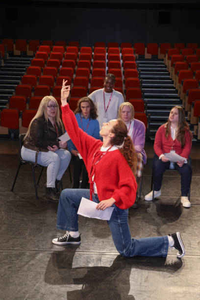 istock Group of disabled people on stage during rehearsal 2196555261