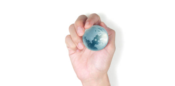 istock Globe ,earth in human hand, holding our planet glowing. Earth image provided by Nasa 2196558691