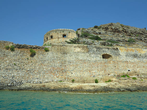 istock View on ruins of Spinalonga Fortressi, Former leper colony, Crete, Greece 2196562012