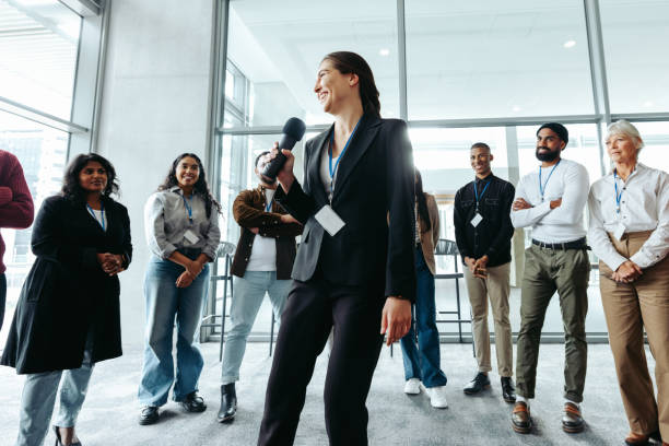 istock CEO addressing workers during a casual meeting with diverse team members in modern office 2196562562