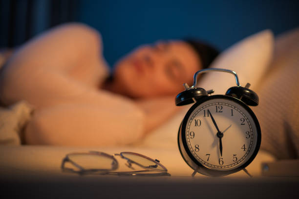 istock Woman is sleeping in her bedroom 2196569686