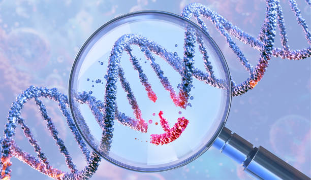 istock DNA double helix under a magnifying glass, symbolizing genetic engineering and gene manipulation. 2196575232