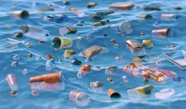 istock Ocean pollution. A sea surface littered with plastic bottles, debris, bags, food packaging. 2196576113