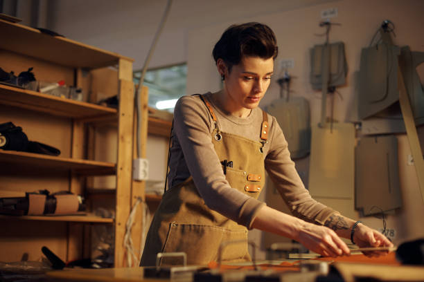 istock Handcrafting Leather Goods in Artisan Workshop 2196579086