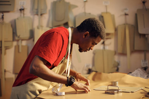 Measuring Fabric and Cutting Pieces in Tailor Shop
