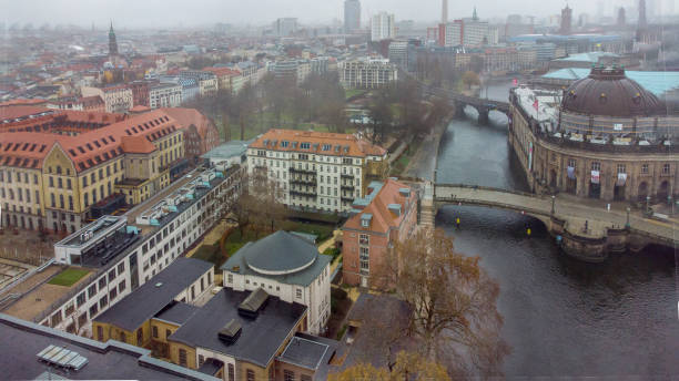 istock Ukrainian flags over the Bode-Museum in Berlin and Spree river  and Fernsehturm 2196579487