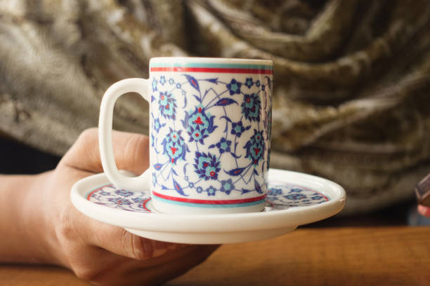 istock woman drinking turkish coffee at cafe 2196580092