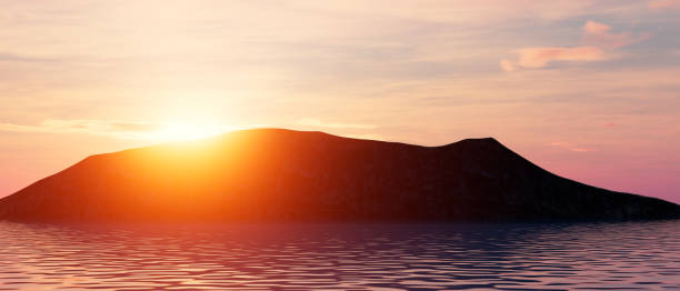 istock A mountain is silhouetted against a beautiful sunset 2196582662