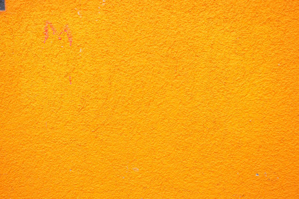 Bright orange textured wall that is suitable for a multitude of various creative applications