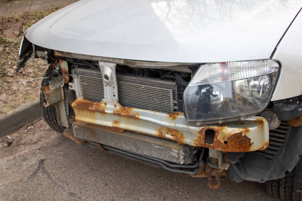 istock Broken bumper of a gray car closeup 2196583168