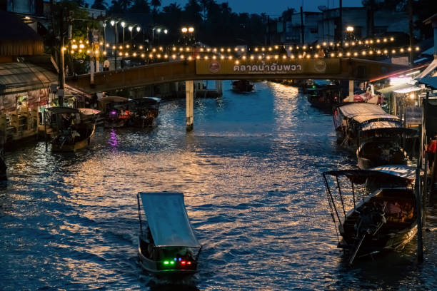 istock Amphawa floating market in Thailand at night 2196586150