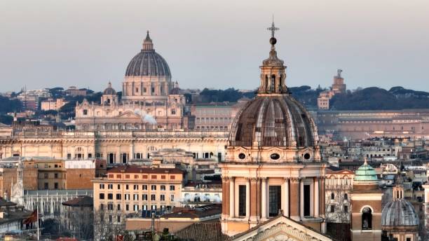 istock St. Peter's Dome at Sunset. Rome, Italy. 2196591749