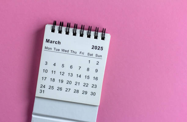 istock Desk calendar for March 2025 on a pink background. 2196591977