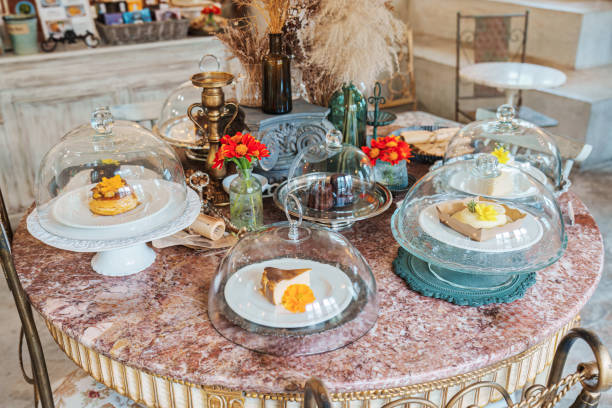 istock Various desert under glass dome on marble table decorated with antique style 2196592101