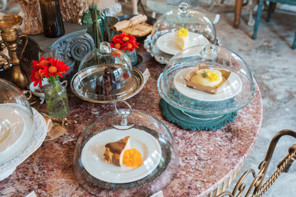 istock Various desert under glass dome on marble table decorated with antique style 2196592108