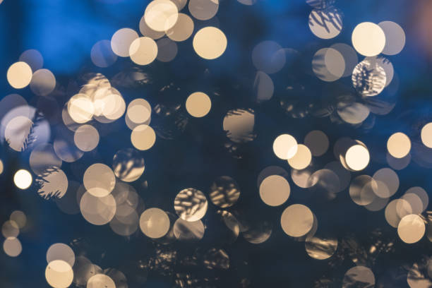 Out of focus christmas lights in blue evening light..