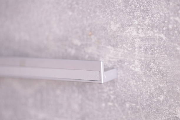 istock A close-up view of a shelf on a wall with decorative items and textures 2196598677