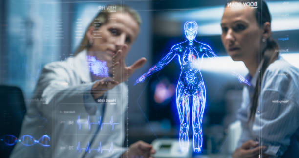 istock Physician And Patient Examine Holographic Body Models. Biosensors And AI-Driven Tissue Mapping Integrate Real-Time Metabolic Markers, Nanoscale Diagnostics, Targeted Biomolecular Intervention Planning 2196602920