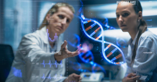 istock Physician And Patient Examine A Holographic Dna Model. AI-Powered Genomic Analysis Highlights Mutation Hotspots And Therapeutic Targets In Real-Time, Precision Medicine And Targeted Gene Therapies. 2196603066