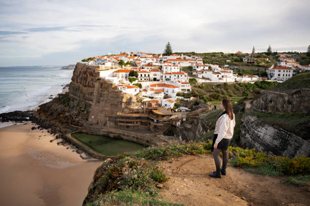 istock Woman looking at the view in Azenhas do Mar 2196604739