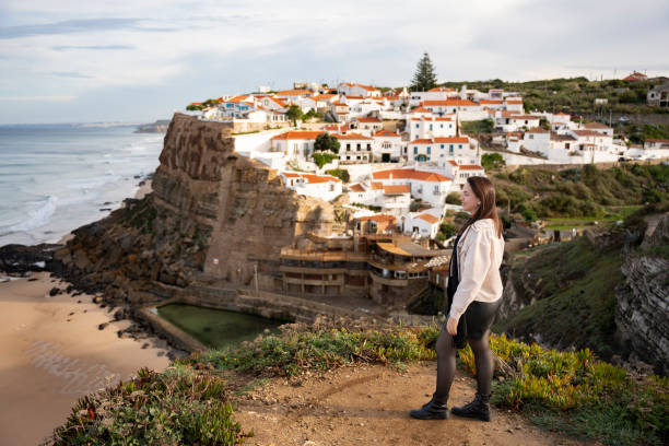 istock Woman looking at the view in Azenhas do Mar 2196604781