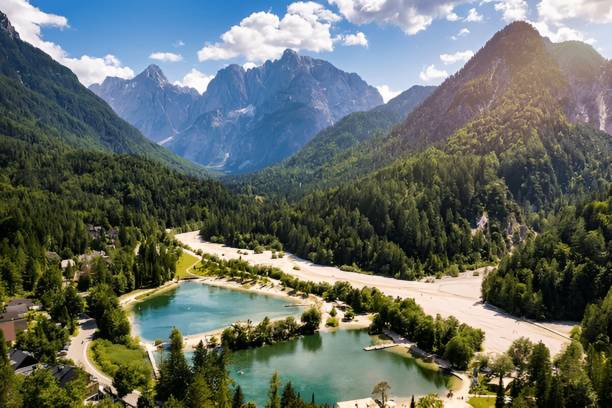 Great nature scenery in Slovenian Great nature scenery in Slovenian Alps. Incredible summer landscape on Jasna lake. Triglav national park. Kranjska Gora, Slovenia. Mountain lake Jasna in Krajsnka Gora, Slovenia. julian alps stock pictures, royalty-free photos & images