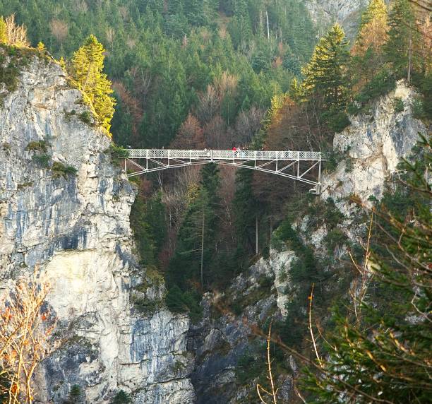 istock Rugged mountain rocks and bridge in Autumn, Bavaria Germany 2196611191