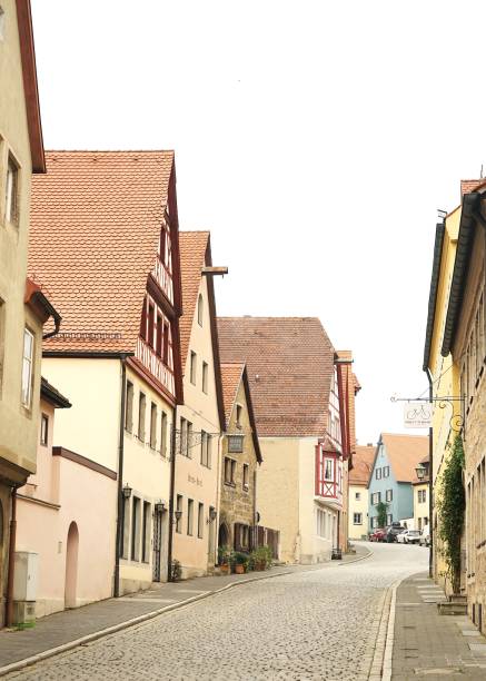 istock Cobblestone pathway with medieval buildings Germany 2196611378