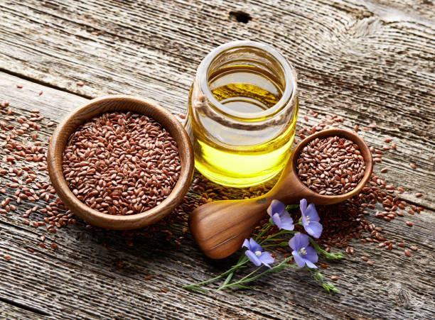 istock Flax oil on wooden board 2196616014