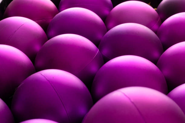 background of shiny purple spheres