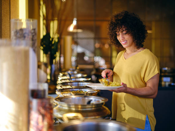 istock Woman at an Indian Restaurant 2196617652