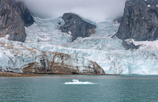 istock Glacier Flowing Past a Nunatak in the Arctic 2196618932