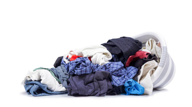 istock plastic tub with heap of clothes 2196624304