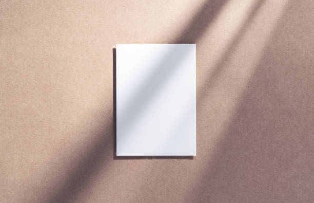 Blank vertical 5x7, A4 paper mockup with gobo lighting