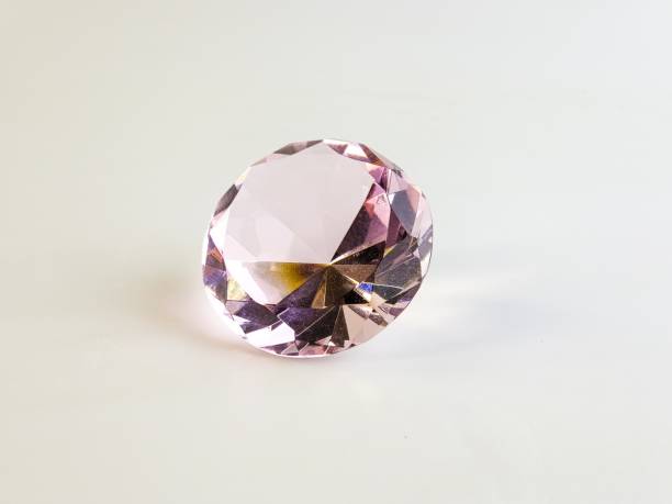 istock Pink crystal crystal on a white background. Close-up. Transparent stone 2196637537