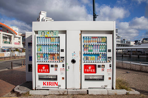 Kobe, Japan - November 19, 2024.Two drink vending machines at Kobe Harborland in Kobe, Japan.