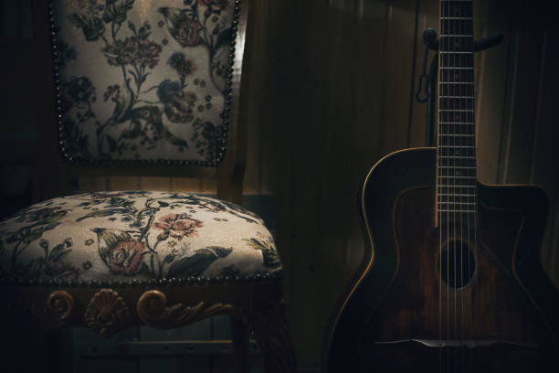 istock Decorative chair and gypsy guitar 2196640350