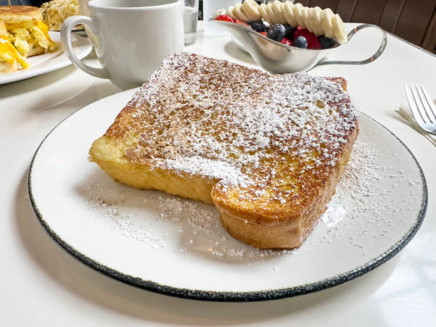 Brioche French Toast with Bacon, Eggs and Fresh Fruit