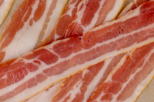 istock fresh thinly sliced pork bacon with meat and bacon 2196645177