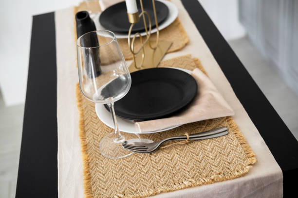 istock Elegant dining table setting with stylish decor and accessories for a meal 2196653509