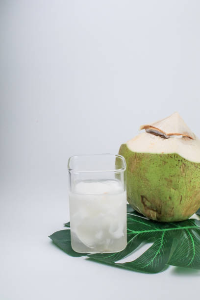 istock Fresh coconut juice on white background. Organic healthy tropical drink. 2196654780
